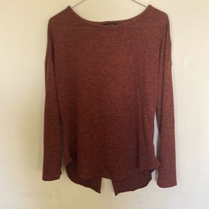 Rust long sleeve sweater with bow detail on back